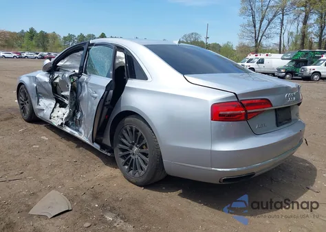 2015 Audi A8 L 4.0T z USA, uszkodzony, nr VIN WAU32AFD2FN038880